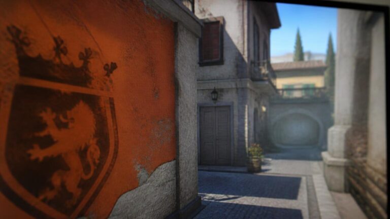 Detalhe de mapa de jogo com mural escondido e símbolo referenciando título anterior